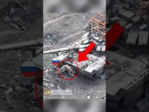 Ukrainian Drone Hunts Down Russian Soldiers Hiding Under a Tank